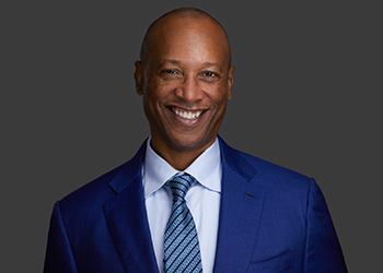 James Dorsey wearing a blue suit